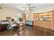 Bedroom with natural light, hardwood floors and custom built-in shelves and cabinets at 1382 Varner Rd, Marietta, GA 30062