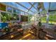 The greenhouse interior features seating, plants, and views of the garden at 1382 Varner Rd, Marietta, GA 30062