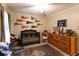 Cozy bedroom featuring a black crib, a decorative rug, and wall decor at 184 Wildflower Dr, Social Circle, GA 30025