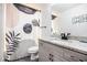 Stylish bathroom with a granite-topped vanity and decorative shower curtain at 76 Mayson Avenue Northeast Ne, Atlanta, GA 30307