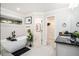 Spa-like bathroom featuring a soaking tub, dual vanities, and a walk-in closet at 76 Mayson Avenue Northeast Ne, Atlanta, GA 30307