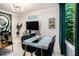 Dining area showcasing a modern table setting, adjacent to a well-lit living space at 76 Mayson Avenue Northeast Ne, Atlanta, GA 30307