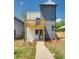 Contemporary two-story home with a balcony, neutral color scheme, and a well-manicured lawn at 76 Mayson Avenue Northeast Ne, Atlanta, GA 30307