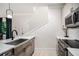 Modern kitchen featuring quartz countertops, subway tile, and stainless steel appliances at 76 Mayson Avenue Northeast Ne, Atlanta, GA 30307
