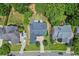 Aerial view of a house with a well-manicured lawn and backyard at 956 Kinghorn Nw Dr, Kennesaw, GA 30152
