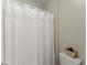 Simple white shower and toilet at 956 Kinghorn Nw Dr, Kennesaw, GA 30152