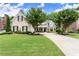 Beautiful traditional home with a well-manicured lawn and charming curb appeal at 956 Kinghorn Nw Dr, Kennesaw, GA 30152