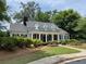 Charming home with a well-maintained lawn and landscaped front yard at 956 Kinghorn Nw Dr, Kennesaw, GA 30152