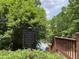 A bridge with a sign reading that access to the lake is restricted to Woodbridge residents only at 956 Kinghorn Nw Dr, Kennesaw, GA 30152