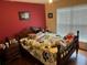 Cozy bedroom featuring natural light from a large window and wood flooring at 2256 Hansford Pass, Buford, GA 30519