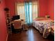 Bedroom with desk space, overhead lighting and wood flooring at 2256 Hansford Pass, Buford, GA 30519