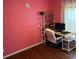 Bedroom with desk space, overhead lighting and wood flooring at 2256 Hansford Pass, Buford, GA 30519