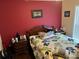 Bedroom featuring colorful decor, hardwood floors, and ample natural light at 2256 Hansford Pass, Buford, GA 30519