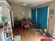Dining area with a large table and curtains at 2256 Hansford Pass, Buford, GA 30519