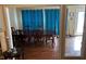 Dining room featuring a large table, chairs, and natural light at 2256 Hansford Pass, Buford, GA 30519