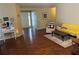 Inviting living room with hardwood floors, neutral walls, and ample natural light at 2256 Hansford Pass, Buford, GA 30519