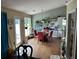 Open-concept living and dining area with hardwood floors at 2256 Hansford Pass, Buford, GA 30519