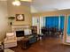 Inviting living room with a fireplace, hardwood floors, and ample seating at 2256 Hansford Pass, Buford, GA 30519