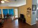 Inviting living room features hardwood floors and neutral wall paint at 2256 Hansford Pass, Buford, GA 30519