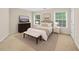 Comfortable bedroom with neutral tones, two windows and light colored carpet at 3065 Moser Way, Marietta, GA 30060