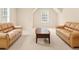 Bonus room with neutral carpet and two sofas offers versatile living space at 3065 Moser Way, Marietta, GA 30060
