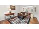 Comfortable living room with hardwood floors and leather sofa at 3065 Moser Way, Marietta, GA 30060