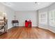 Bright office space featuring hardwood floors and windows with plantation shutters at 3065 Moser Way, Marietta, GA 30060