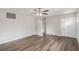 Bright living room boasting stylish wood floors and a modern ceiling fan at 3787 Stephanie Sw Dr, Atlanta, GA 30331