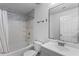 Bright bathroom featuring a shower-tub combo and vanity with sleek fixtures at 4203 Fairington Village Dr, Lithonia, GA 30038