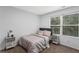 Cozy bedroom with natural light and neutral tones, perfect for relaxation at 4203 Fairington Village Dr, Lithonia, GA 30038