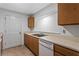 Functional kitchen with laminate countertops and classic wooden cabinets at 4203 Fairington Village Dr, Lithonia, GA 30038