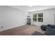 Bright living room with large window providing great natural light at 4203 Fairington Village Dr, Lithonia, GA 30038