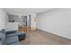 Comfortable living room featuring plush carpeting and a modern blue sofa at 4203 Fairington Village Dr, Lithonia, GA 30038