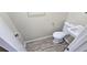 A half bath with toilet and sink at 508 Jaywood Dr, Stone Mountain, GA 30083