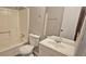 Bathroom featuring bathtub and shower combo, toilet, and vanity at 508 Jaywood Dr, Stone Mountain, GA 30083