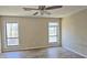 Bedroom featuring ceiling fan, wood-look floors, and natural light at 508 Jaywood Dr, Stone Mountain, GA 30083