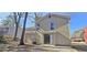Home exterior view featuring a sliding glass door to backyard at 508 Jaywood Dr, Stone Mountain, GA 30083