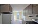 Kitchen view with updated countertops and dark wood cabinets at 508 Jaywood Dr, Stone Mountain, GA 30083