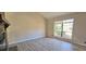 Living room with stone fireplace, wood-look floors and lots of natural light at 508 Jaywood Dr, Stone Mountain, GA 30083