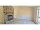 Spacious living room featuring stone fireplace and wood-look floors at 508 Jaywood Dr, Stone Mountain, GA 30083