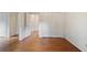 Open bedroom with hardwood floors, neutral walls and walk-in closet at 59 Oakmont Nw Dr, Marietta, GA 30064
