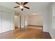 Open living room with hardwood floors, neutral walls and white doors at 59 Oakmont Nw Dr, Marietta, GA 30064