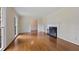 Spacious living room features hardwood floors, bright light and fireplace at 59 Oakmont Nw Dr, Marietta, GA 30064