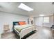 Basement bedroom features a double bed, dresser, and bright lighting at 8 Southview Dr, Cartersville, GA 30121