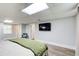 Basement bedroom with a bed, TV, closet and view to other rooms at 8 Southview Dr, Cartersville, GA 30121
