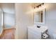 Half bathroom showcasing sink, cabinet, mirror, and modern vanity lighting at 8 Southview Dr, Cartersville, GA 30121