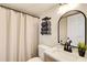 Bathroom features a shower, toilet, sink, mirror, and a small plant at 8 Southview Dr, Cartersville, GA 30121