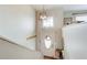 Bright foyer with decorative lighting, coat hooks, and wooden floors at 8 Southview Dr, Cartersville, GA 30121