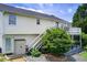Home's exterior features a two-story deck, access door, storage shed and lush landscaping at 8 Southview Dr, Cartersville, GA 30121
