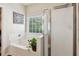 Bright bathroom with separate tub and shower at 1714 Indian Way, Cumming, GA 30040